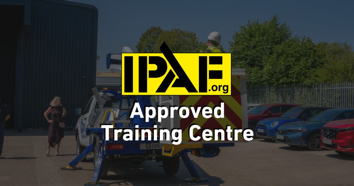 IPAF Approved Training Centre badge overlaid on a CPL cherry picker being set up outdoors
